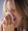 picture of person blowing nose